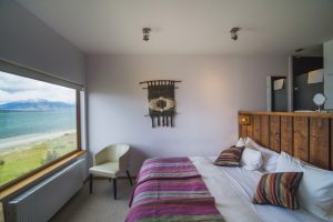 Bedroom in a suite at Weskar Patagonia Lodge, Puerto Natales, Chilean Patagonia, Chile