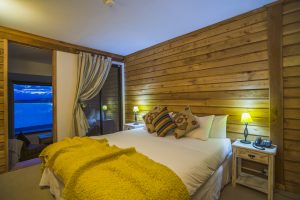 Bedroom in a suite at Weskar Patagonia Lodge, Puerto Natales, Chilean Patagonia, Chile