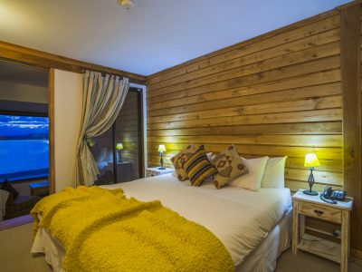 Bedroom in a suite at Weskar Patagonia Lodge, Puerto Natales, Chilean Patagonia, Chile